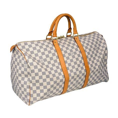 white louis vuitton duffle bag.